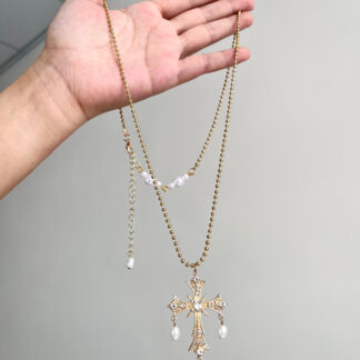 Vintage gold-tone cross and pearl-look drop necklace