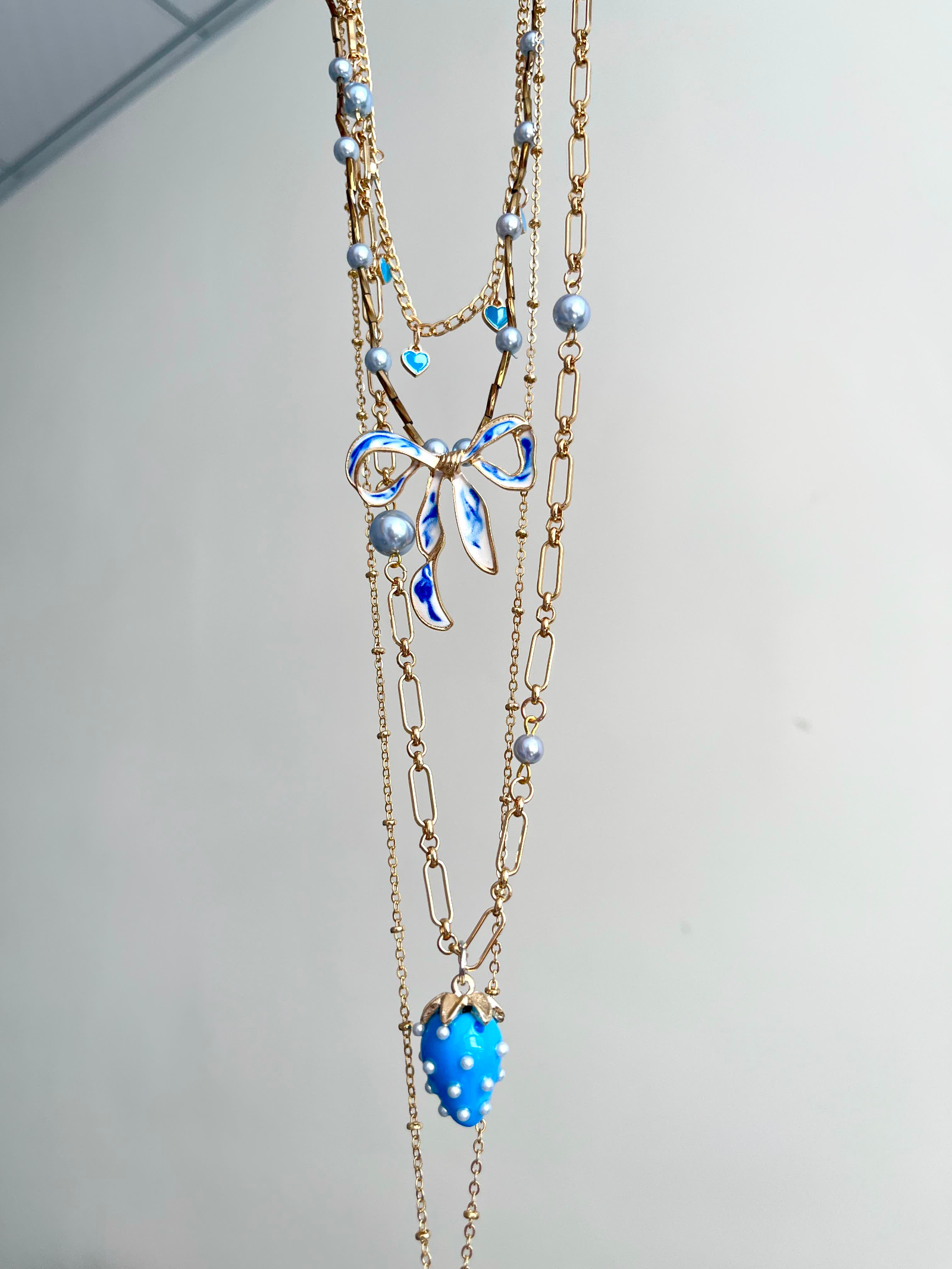 Blue Bow & Strawberry Charm Layered Necklace - Image 4